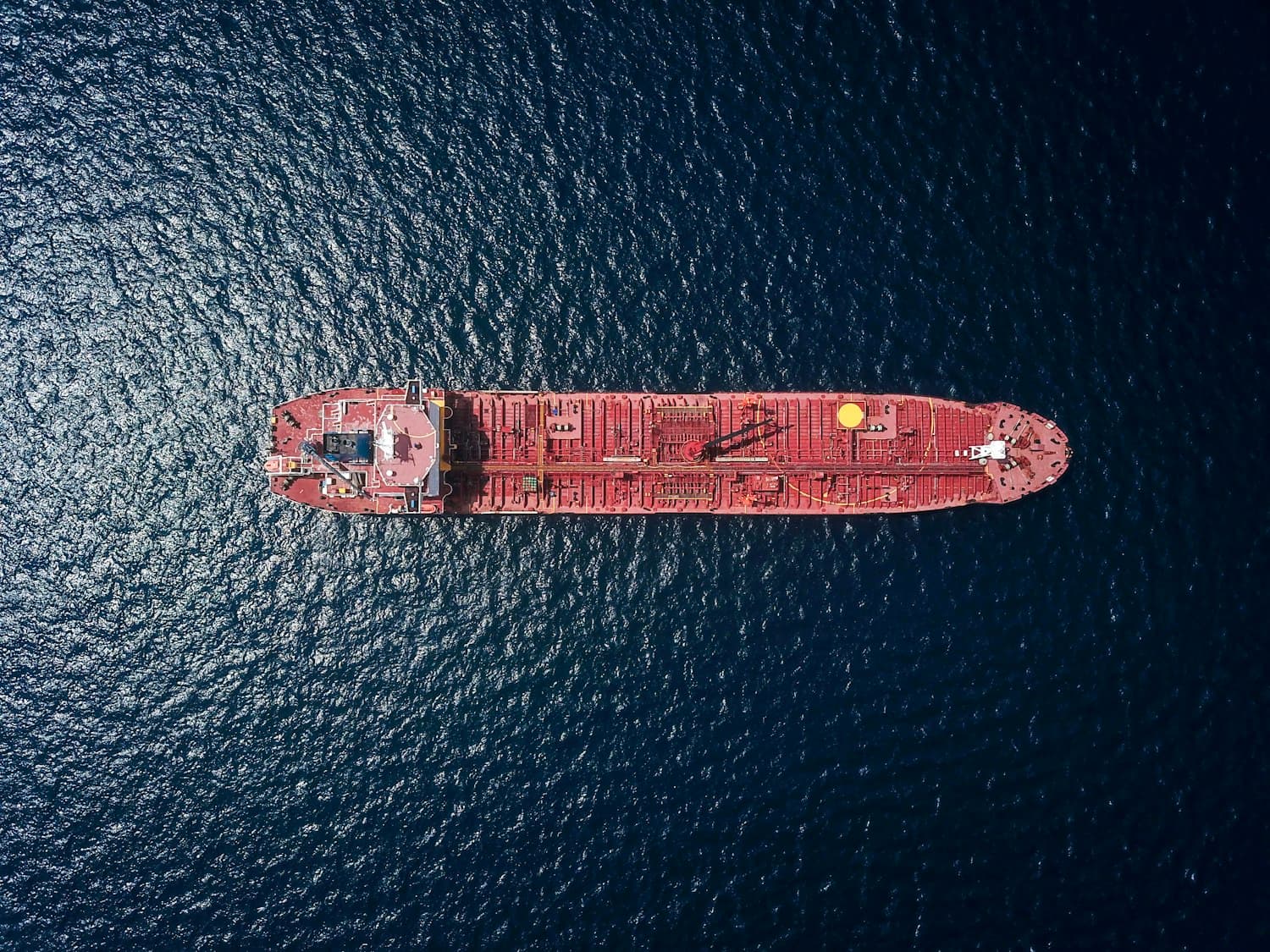 Bulk carrier loading cargo at a commercial terminal